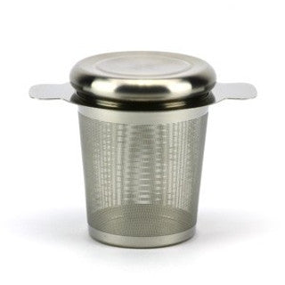 A stainless steel loose leaf tea strainer with a lid and side handles, designed to fit over a cup or teapot.