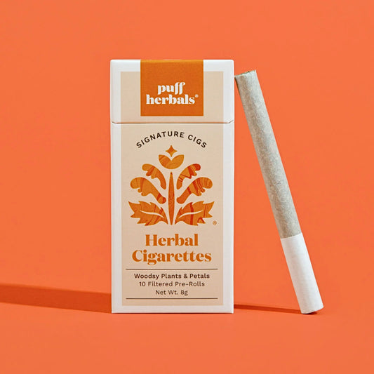 Box of herbal cigarettes labeled Signature by Puff Herbals