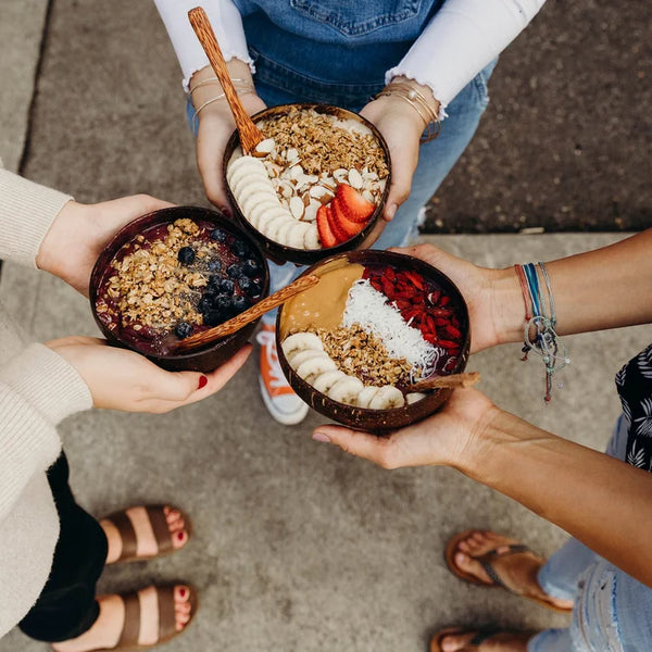 Three colorful smoothie bowls representing the $15 gift card raffle item offered by Hi There Juice Co.