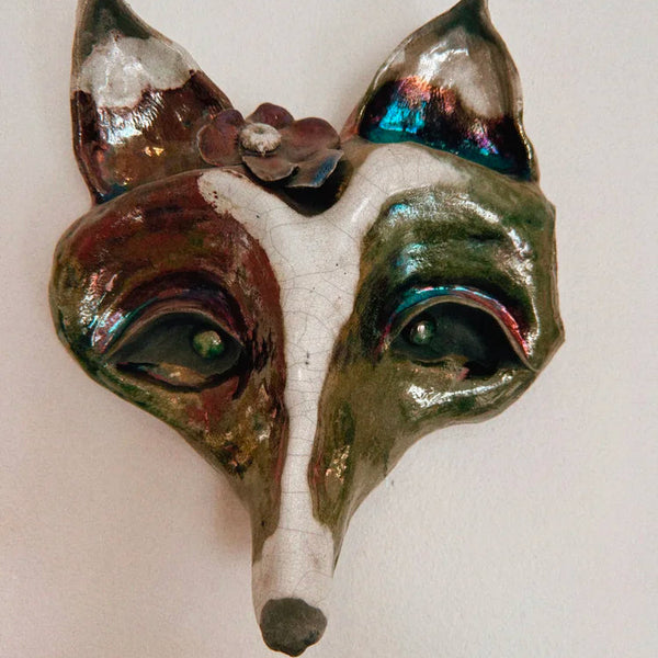 A hand sculpted pottery fox mask made in a Kadence Collective class (one of the raffle items)