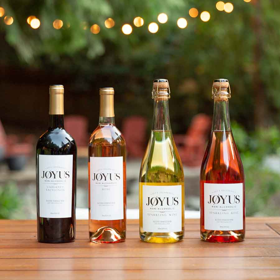 row of bottles of joyus wines